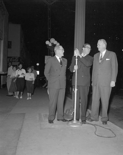 100,000th street light is turned on by Mayor Norris Poulson at the spot where the city’s first electric street light was installed in 1882