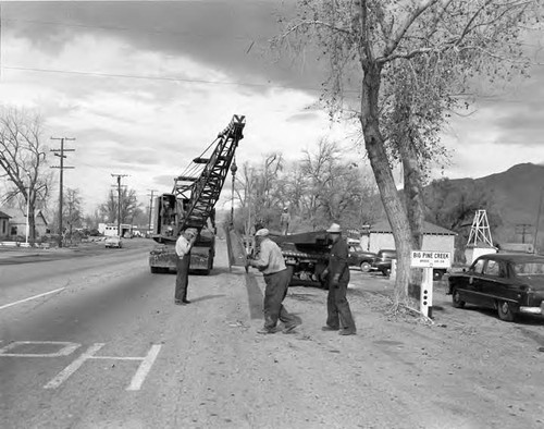 Series of photos showing the moving of one of the 90 thru ton rotors to the Gorge project