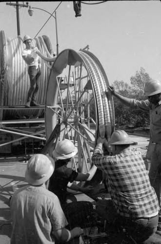 Laying high voltage aluminum underground cable at Oxnard Blvd. and Fulton Ave