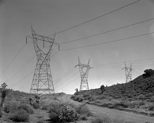 Three single circuit tower lines in desert area