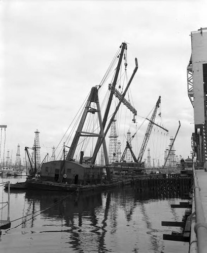 Laying a 'U' shaped pipe across the channel