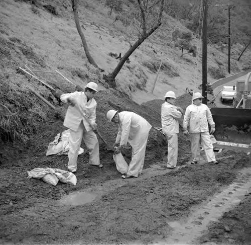 Sandbagging and road clearing