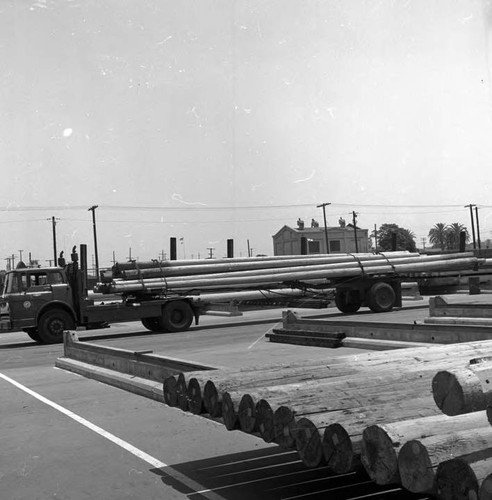 Photo for highway patrol report - pole yard at Slauson and Long Beach