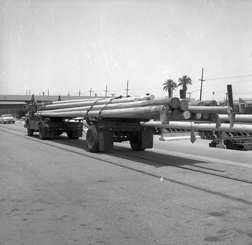 Photo for highway patrol report - pole yard at Slauson and Long Beach