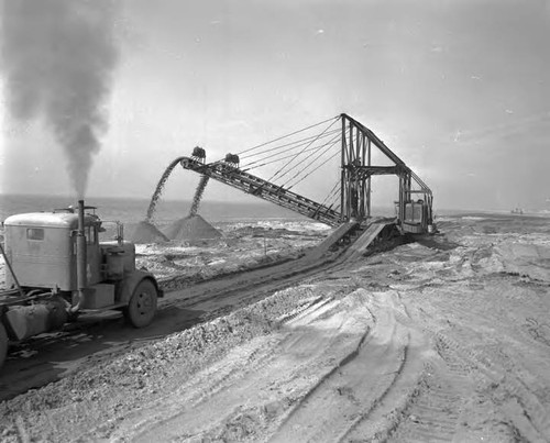 Sand spreading equipment used to prepare site for Scattergood Steam Plant