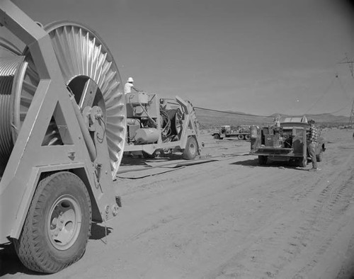 Wire stringing on 3rd circuit construction from Boulder line