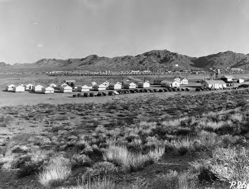 Boulder Dam transmission line construction camp of the Department of Water and Power, with Boulder City in the background