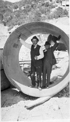 William Mulholland and Commissioner Del Valle in an 80" pipe at Power Plant 1 construction