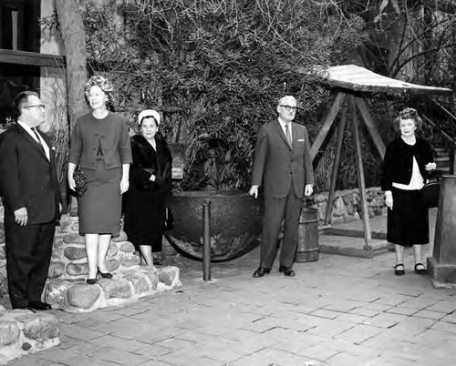 Christine Sterling with two men and two women in front of the Avila Adobe