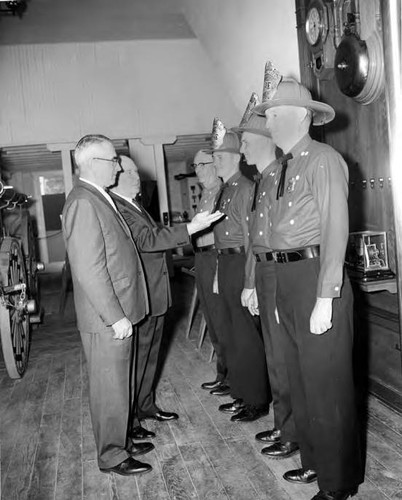 Firemen undergoing inspection at the Firehouse Dedication