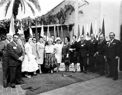 Consuelo Bonzo with group in front of the Latin American Trade Mart