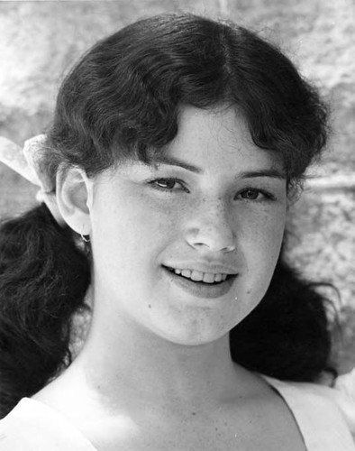 Photograph of a girl smiling on Flower and Camera Day