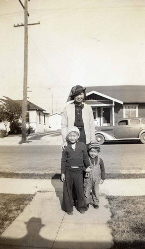Gilbert and Ronald Siu with mother, Dorothy Siu