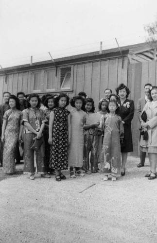 Photograph of a group of young girls with Lily Chan on the right