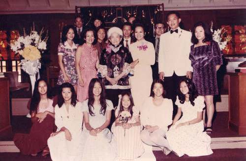 Family wedding photo in a church, Ko Po Kwok is in the center