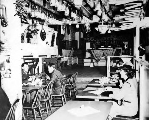 Interior of La Golondrina with people eating