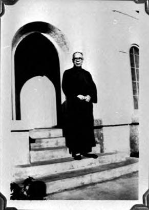 Y.H. Chong in front of home