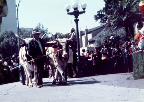 Crowds of people clebrating in the Plaza and on Olvera Street