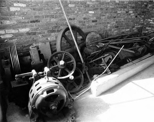 Photograph of ground floor of the Garnier Building, the compnent parts for an elevator