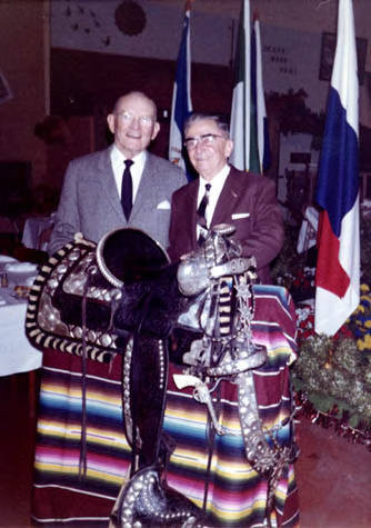 Eugene Biscailuz and Sheriff Zmeritus and his silver mounted saddle that he rode in traditional parade, that is to be displayed