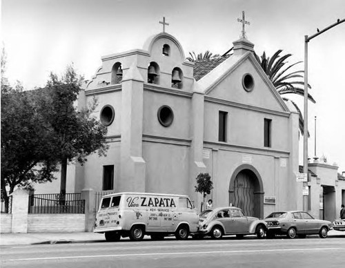 Frontal shot of Plaza Church with "Viva Zapata" truck parked outside