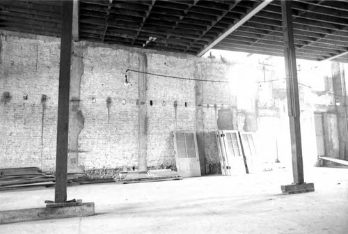 Photograph of the supporting wall for the Pico House