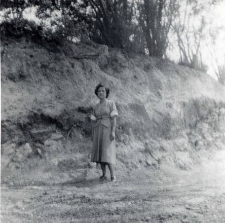 Woman standing on a dirt road (Spencer Chan Family)