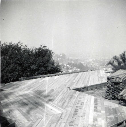 Photo of the ground floor planks laid down. On the back of the photo it reads "sub floors" (Spencer Chan Family)