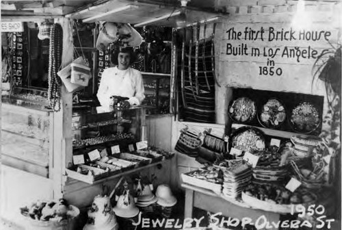 Jewelry shop in front of the firsty brick house built in Los Angeles on Olvera Street