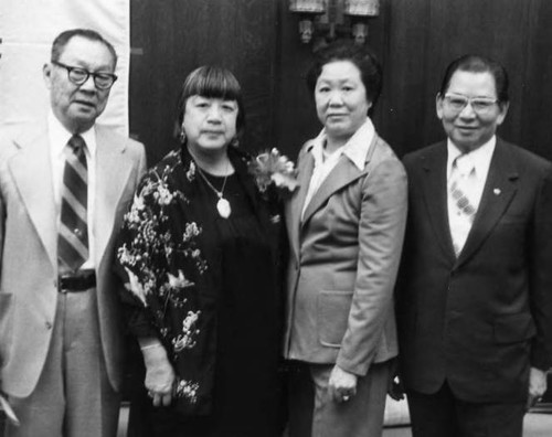 From left to right are: Stanley Chan, Lily Lum Chan, Mrs. Poy Wong and Poy Wong. Lily Lum Chan received an award at Los Angeles City Hall