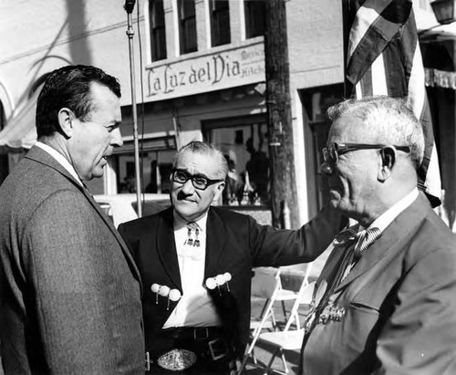 Hubert Laugharn talking to Mario Valadez and Sousa at the Sunset Boulevard closing
