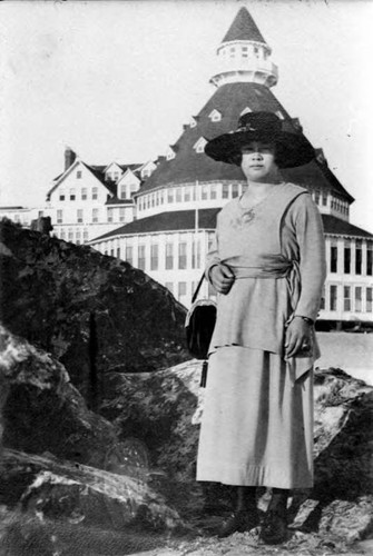 Mrs. George Fong in front of Hotel del Coronado