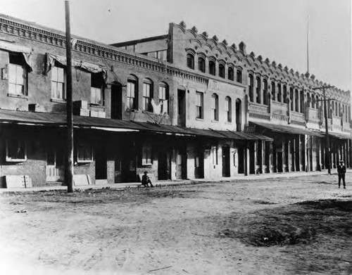 East side of Los Angeles Street, between Plaza and Aliso Streets