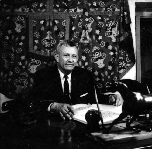 Mario Valadez sitting at a desk