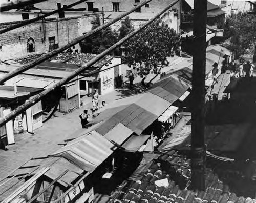 Birds-eye-view of merchandise booths along Olvera Street