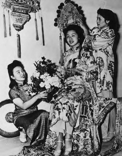 Margaret Kwan Lee, Moon Festival Queen, assisted by two women, being crowned