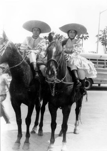 Crowds of people clebrating in the Plaza and on Olvera Street