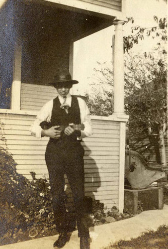 Tom holding a ukulele