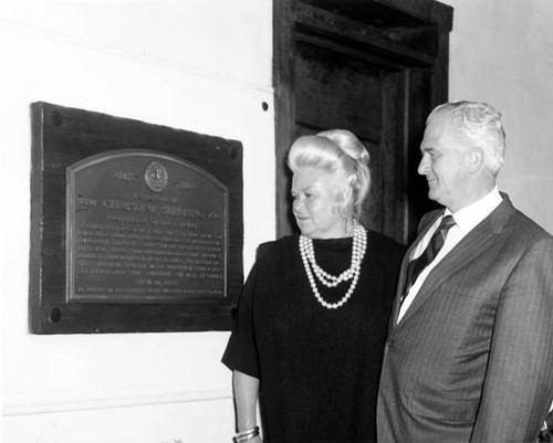 June and Jack Parks looking at Christine Sterling plaque