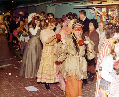 Marching woman dressed as Indian