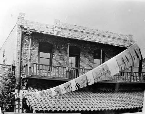 Oblique view of Sepulveda House through fringe