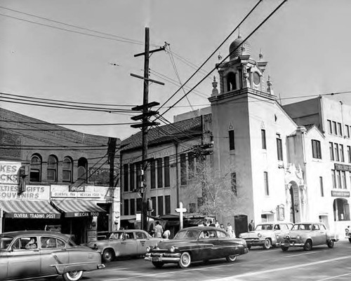 View of Methodist Plaza Church at an angle- looking from Simpson Building- cars driving by on Sunset Boulevard