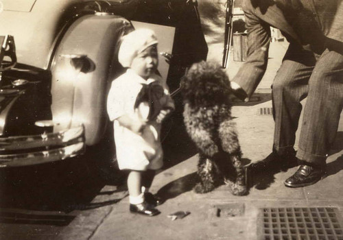 Photo of Rodney Low with a dog