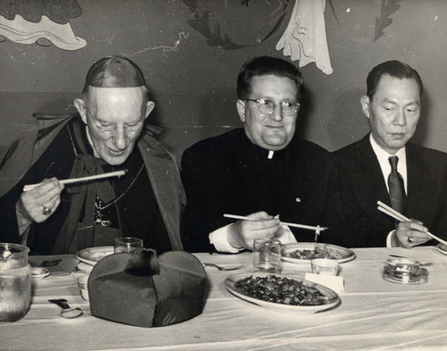 Stanley Chan and two Catholic clergymen at Ming's Restaurant in Vancouver, B.C., Canada