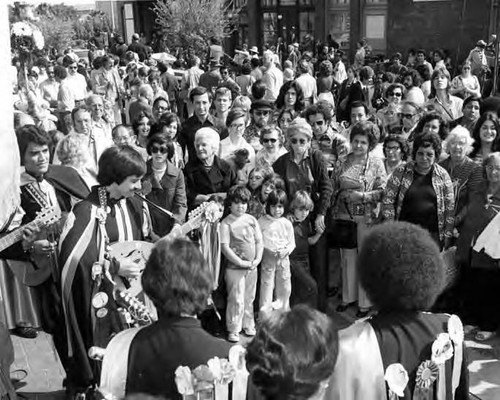 Crowds of people clebrating in the Plaza and on Olvera Street