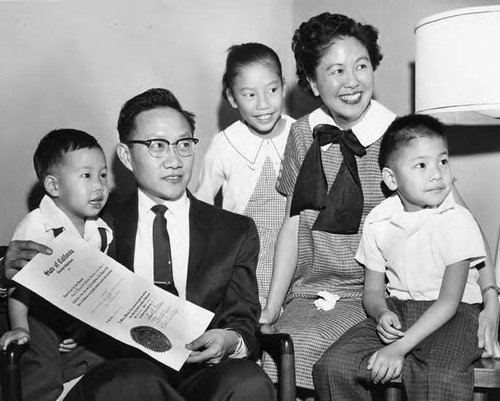 From left to right are: Kent, Delbert, Shelley, Dolores and Duane were posing for a picture on the day Delbert Wong received the official notification. At the time of this photo, Dolores, his wife was expecting a fourth child