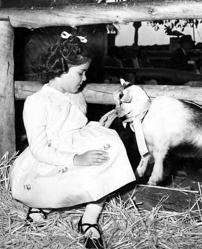 Girl with goat at Blessing of the Animals