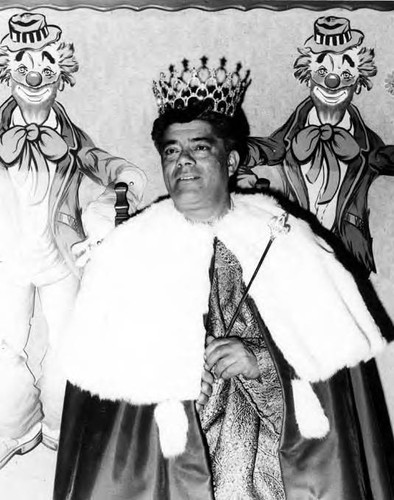 Mike Garcia as Mardi Gras King