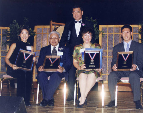 President of the Friends of the Chinese American Museum, Judge Ronald Lew, and four people who were recognized for making history in the Chinese American community. From left to right: World Champion Olympic ice skater Michelle Kwan, Charles Sie, Cindy Fong representing Friends of Chinatown library, Deron Quon on behalf of his grandfather Albert Quon