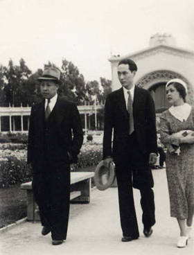 Photo of two men and a woman at the San Diego Fair